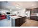 Spacious kitchen with large island, stainless steel appliances, and open view to the living area at 2514 Spergola St, Henderson, NV 89044