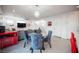 Open concept living space with herringbone floors, modern furnishings, and stylish chandelier at 2514 Spergola St, Henderson, NV 89044