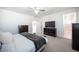 Bright main bedroom boasts neutral decor and access to the ensuite bathroom at 2514 Spergola St, Henderson, NV 89044