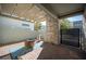 Inviting outdoor patio with brick flooring, pergola, and a cozy fire pit at 2514 Spergola St, Henderson, NV 89044