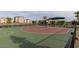 Community basketball court features painted lines, adjustable hoop and shade structure at 2598 Mocha Pearl Ct, North Las Vegas, NV 89086