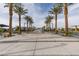 Park with palm trees and water feature surrounded by benches and walking paths in a planned community at 2598 Mocha Pearl Ct, North Las Vegas, NV 89086
