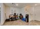 Bright dining area with wood-look flooring and easy access to the staircase at 2598 Mocha Pearl Ct, North Las Vegas, NV 89086
