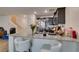 Kitchen with stylish breakfast bar seating, granite countertop, and modern design at 2598 Mocha Pearl Ct, North Las Vegas, NV 89086