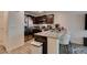 Kitchen area with granite countertop, dark cabinets and stainless steel appliances at 2598 Mocha Pearl Ct, North Las Vegas, NV 89086