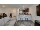 Spacious living room with bar seating and seamless transition to the kitchen at 2598 Mocha Pearl Ct, North Las Vegas, NV 89086