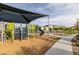 Community playground with various slides, climbing structures and overhead shade at 2598 Mocha Pearl Ct, North Las Vegas, NV 89086