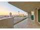 Spacious balcony with glass railings offering panoramic city views at sunset at 2747 Paradise Rd # 1706, Las Vegas, NV 89109