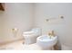 Elegant bathroom featuring a toilet and bidet with gold hardware at 2747 Paradise Rd # 1706, Las Vegas, NV 89109
