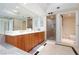 Spacious bathroom featuring double sinks, tub, and a separate shower at 2747 Paradise Rd # 1706, Las Vegas, NV 89109