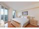 Cozy bedroom with natural light, hardwood floors, and city views at 2747 Paradise Rd # 1706, Las Vegas, NV 89109