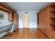 Bedroom featuring a desk area, hardwood floors, and built-in wardrobe storage at 2747 Paradise Rd # 1706, Las Vegas, NV 89109