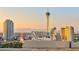 Stunning city view featuring iconic buildings against a colorful sky at sunrise or sunset at 2747 Paradise Rd # 1706, Las Vegas, NV 89109