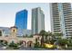 Elegant gated community entrance featuring lush landscaping and architecture at 2747 Paradise Rd # 1706, Las Vegas, NV 89109