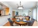 Dining area with a round table and comfortable chairs adjacent to the living area at 2747 Paradise Rd # 1706, Las Vegas, NV 89109