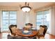 Cozy dining area with elegant chandelier and views from the adjacent patio at 2747 Paradise Rd # 1706, Las Vegas, NV 89109