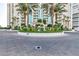 Circular driveway with beautiful landscaping leading to the luxurious building at 2747 Paradise Rd # 1706, Las Vegas, NV 89109