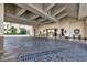 Covered entrance featuring detailed stonework, lush landscaping, and elegant lighting at 2747 Paradise Rd # 1706, Las Vegas, NV 89109