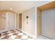 Elegant hallway featuring marble floors, neutral walls, and classic architectural details with elevator access and exit at 2747 Paradise Rd # 1706, Las Vegas, NV 89109