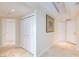Well-lit hallway with marble floors, closet space, and a neutral color scheme, offering ample storage and access to rooms at 2747 Paradise Rd # 1706, Las Vegas, NV 89109