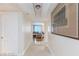 Inviting hallway with bright lighting, marble floors, and a view into the living area, complete with modern decor at 2747 Paradise Rd # 1706, Las Vegas, NV 89109