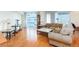 Spacious living area features wood floors, neutral color scheme, and large windows with sliding glass doors at 2747 Paradise Rd # 1706, Las Vegas, NV 89109
