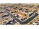 Scenic aerial view of a community nestled in a desert landscape with winding roads and well-kept homes at 2773 Chetco River St, Laughlin, NV 89029