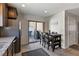 Cozy dining area with table, chairs, and access to the outdoor patio at 2773 Chetco River St, Laughlin, NV 89029