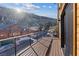 Relaxing balcony view with a mountain backdrop, enhanced by the wood plank decking at 306 Crestview Dr, Las Vegas, NV 89124