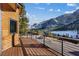 Scenic balcony featuring wood floors and railing, overlooking the picturesque mountain at 306 Crestview Dr, Las Vegas, NV 89124