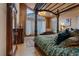 Bedroom with a four poster bed and views at 306 Crestview Dr, Las Vegas, NV 89124