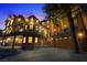 Mountain home exterior featuring stone accents, a balcony, and a two-car garage at 306 Crestview Dr, Las Vegas, NV 89124