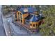 Mountain home featuring unique architecture with large windows and wraparound deck at 306 Crestview Dr, Las Vegas, NV 89124
