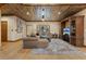 Inviting living room with wood paneled ceiling, hardwood floors and comfortable seating area at 306 Crestview Dr, Las Vegas, NV 89124