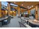 Expansive covered patio with outdoor seating, dining area, and mountain views at 306 Crestview Dr, Las Vegas, NV 89124