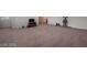 Spacious bonus room with neutral carpet, white walls and plenty of room to relax at 33 Via Di Mello, Henderson, NV 89011