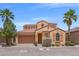 Charming single-Gathering home with a two-car garage, desert landscaping, and a red tile roof at 33 Via Di Mello, Henderson, NV 89011