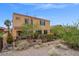 Exterior of a well-maintained home with desert landscaping at 33 Via Di Mello, Henderson, NV 89011