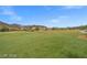 Scenic view of a lush green golf course and neighborhood at 33 Via Di Mello, Henderson, NV 89011
