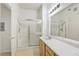 Well-lit bathroom with a glass-enclosed shower and a wide vanity with ample counter space at 3400 Cabana Dr # 2103, Las Vegas, NV 89122