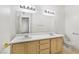 Bright bathroom with double sinks, a large mirror, and generous vanity storage at 3400 Cabana Dr # 2103, Las Vegas, NV 89122