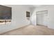 Neutral bedroom with ample natural light, a spacious closet, and cozy carpeting at 3400 Cabana Dr # 2103, Las Vegas, NV 89122