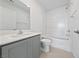 Bright bathroom with a vanity, toilet, and shower/tub combo at 3541 Arcadian Sea St, Las Vegas, NV 89106