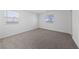 A bright bedroom with two windows bringing in tons of light to the room at 3541 Arcadian Sea St, Las Vegas, NV 89106