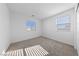 A naturally lit bedroom featuring plush carpeting and bright white walls at 3541 Arcadian Sea St, Las Vegas, NV 89106