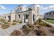 Charming two-story townhouse with drought-resistant landscaping and modern architectural details at 3541 Arcadian Sea St, Las Vegas, NV 89106