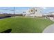 Beautiful community green space area with turf lawn and community benches at 3541 Arcadian Sea St, Las Vegas, NV 89106