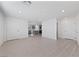 Spacious living room featuring tile flooring and a seamless open floor plan at 3541 Arcadian Sea St, Las Vegas, NV 89106
