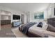 This main bedroom is virtually staged with elegant decor and is brightly lit with natural light at 3541 Arcadian Sea St, Las Vegas, NV 89106