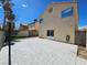 A block walled backyard with a large patio area offering plenty of space for outdoor entertaining at 4064 Browndeer Cir, Las Vegas, NV 89129